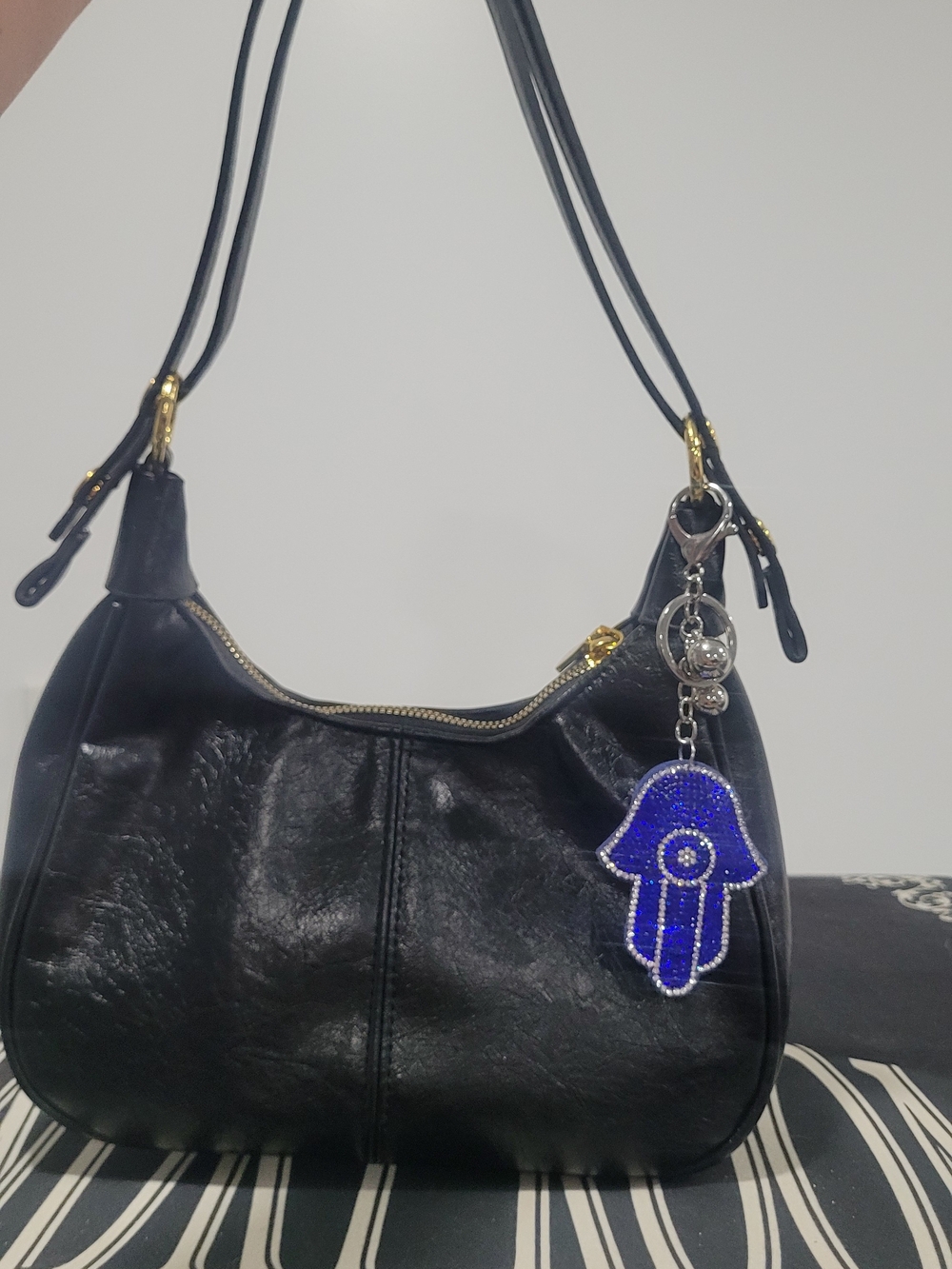 Black Leather Shoulder Bag with Blue Hamsa Charm